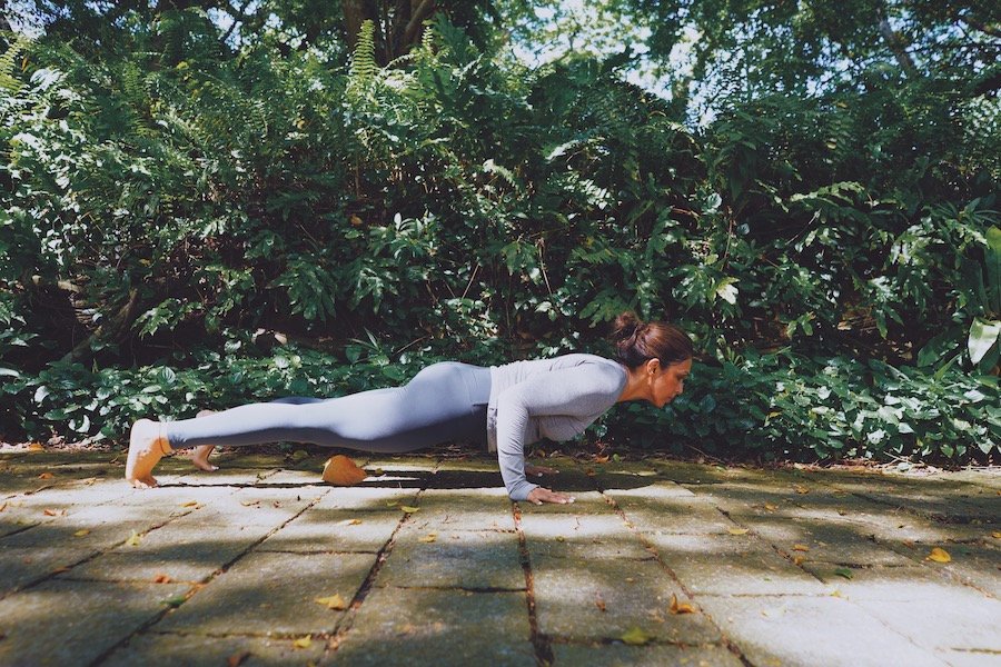 Anugraha practicing yoga outdoors
